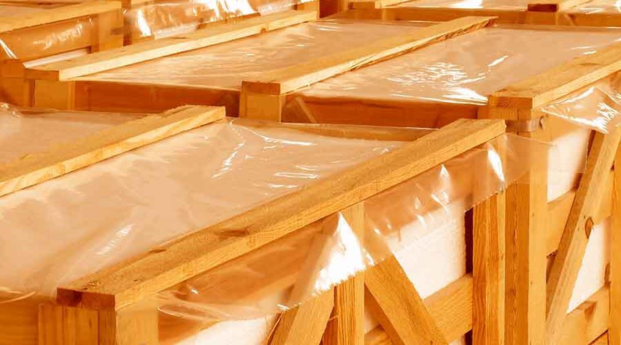 Polythene-Packaging-Covers-Warehouse-with-plastic-covered-crates