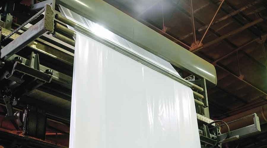 The-Product-Range-Polythene-Packaging-Top-detail-of-print-and-wrapping-machine-with-white-stretch-wrap